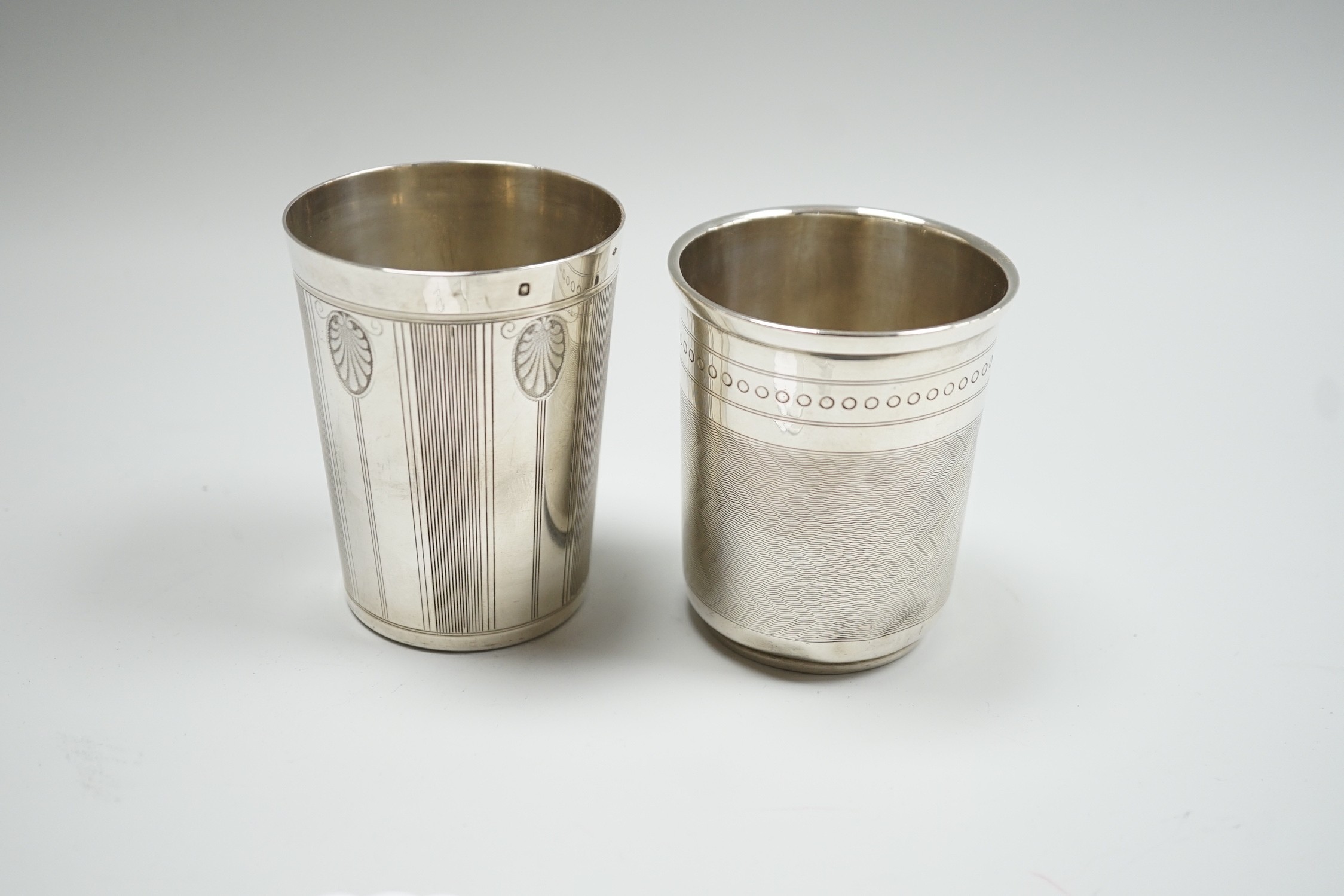 Two early 20th century French engraved 950 standard white metal beakers, tallest 84mm, 4.7oz.